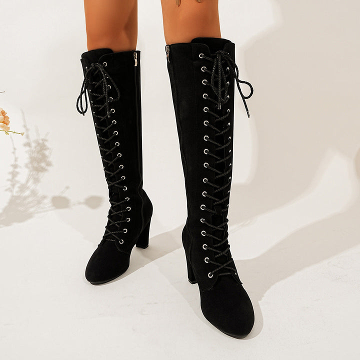 Women’s over-the-knee boots with lacing detail and a zipper