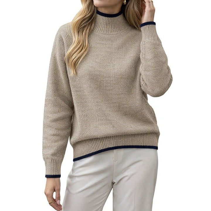 Women's sweater with a stand-up collar, contrasting cuffs, and a relaxed fit