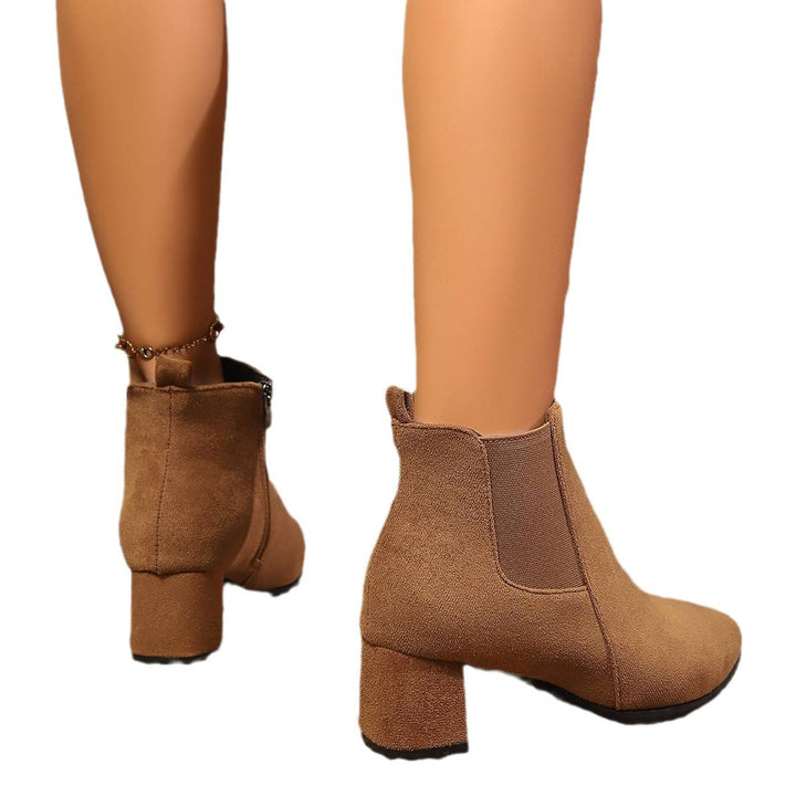 Women’s ankle boots with block heels and a zipper