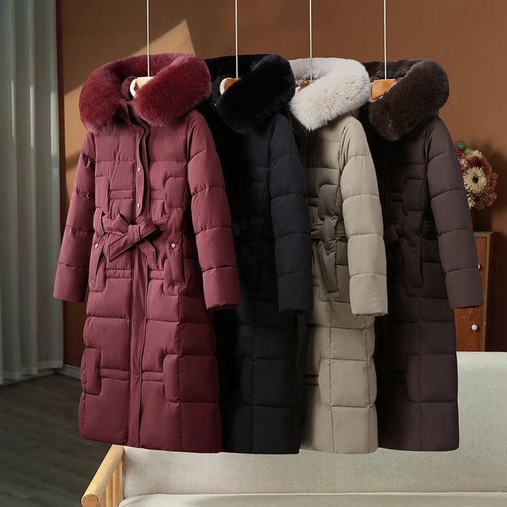 Women’s long quilted winter coat with detachable faux-fur collar and waist belt
