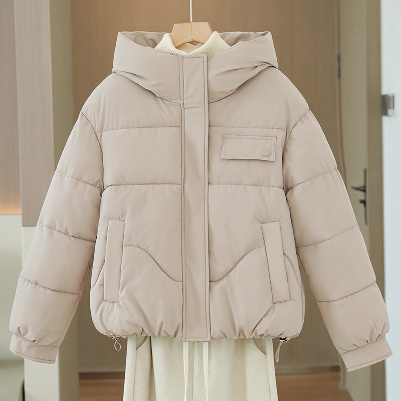 Women's short quilted hooded jacket with a concealed zipper