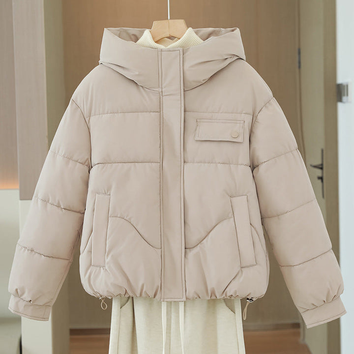 Women's short quilted hooded jacket with a concealed zipper