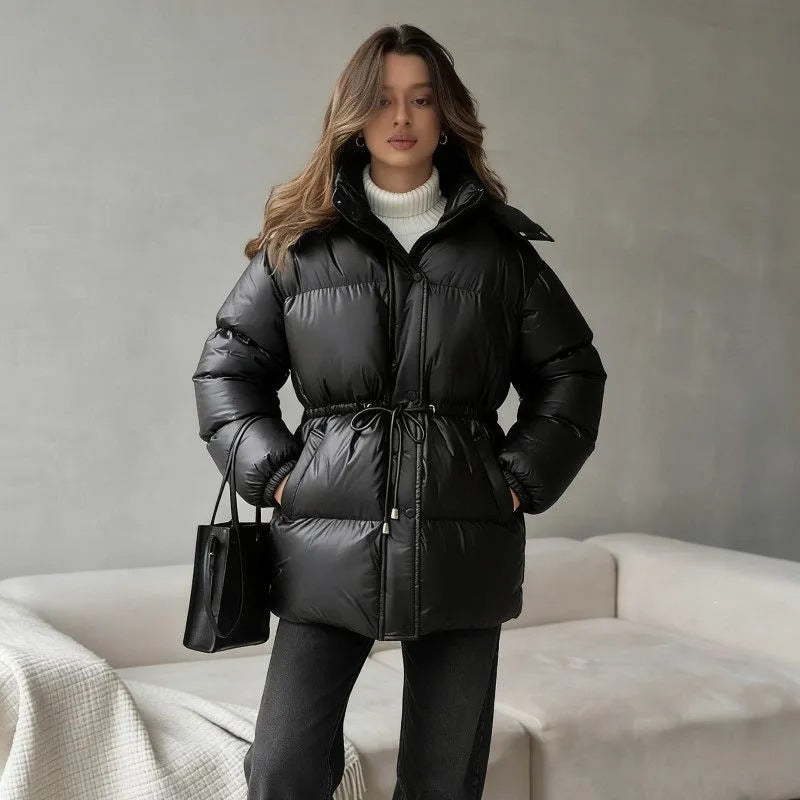 Women's hooded jacket with an adjustable waist drawstring and glossy finish
