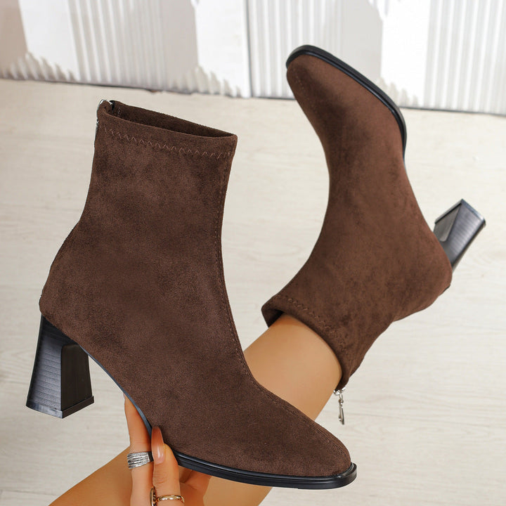 Women’s suede ankle boots with block heels and a zipper