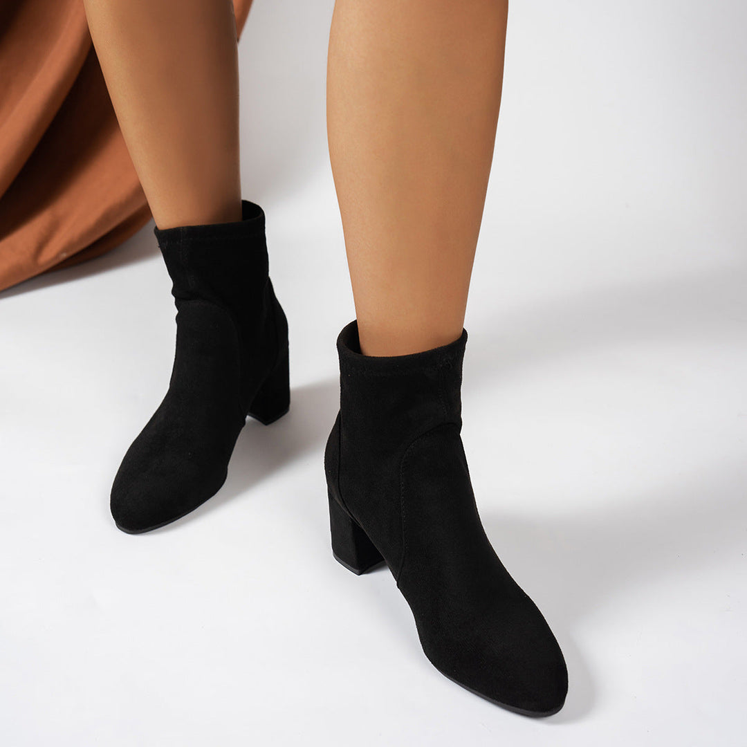 Women’s suede ankle boots with a block heel and cushioned insole