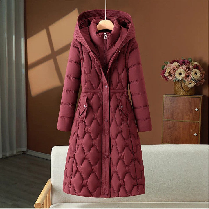 Women’s long quilted winter coat with a hood and fitted silhouette