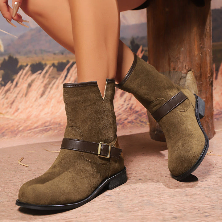 Women's ankle boots with a V-cut, strap, and buckle