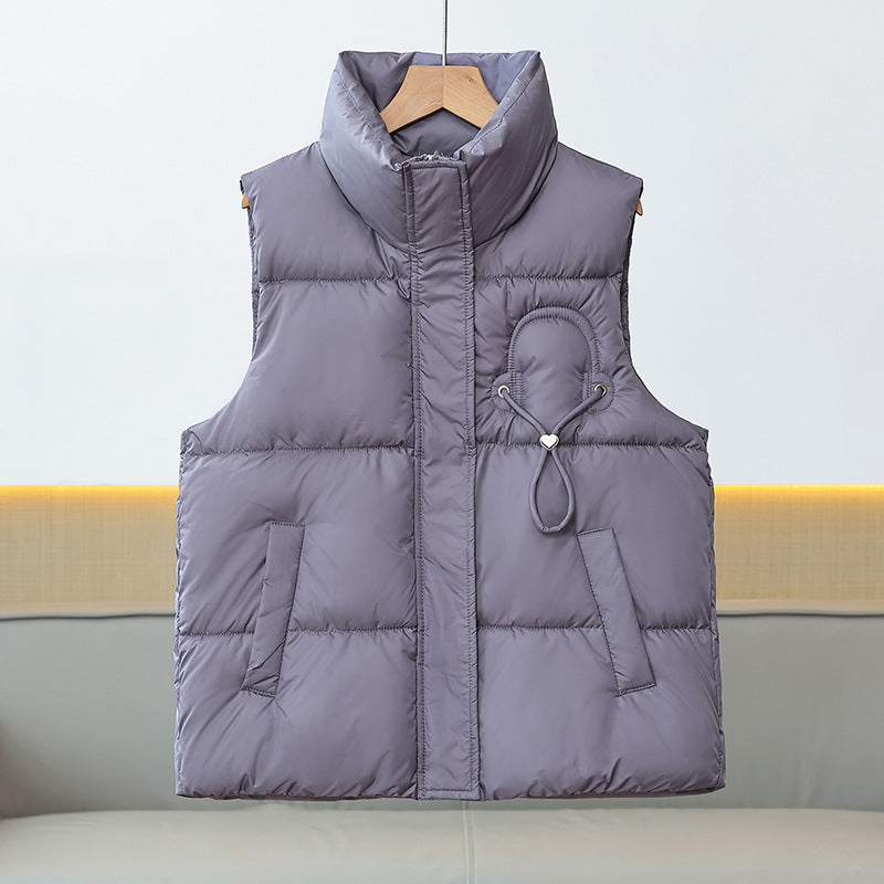Women’s lightweight quilted padded vest with a high stand-up collar and cord trim