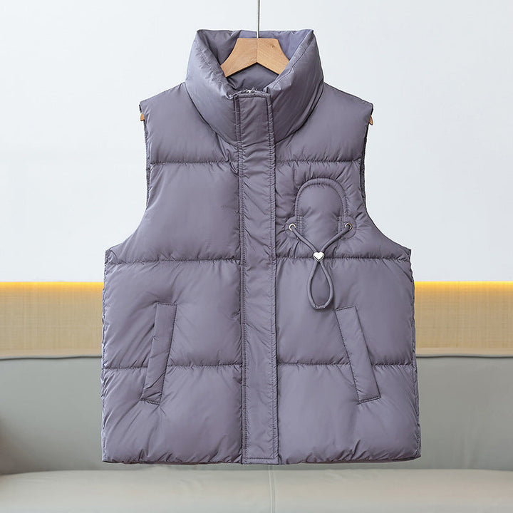 Women’s lightweight quilted padded vest with a high stand-up collar and cord trim