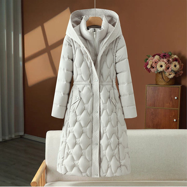 Women’s long quilted winter coat with a hood and fitted silhouette