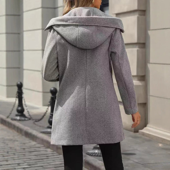 Women's jacket with large buttons, a notched collar, and pockets