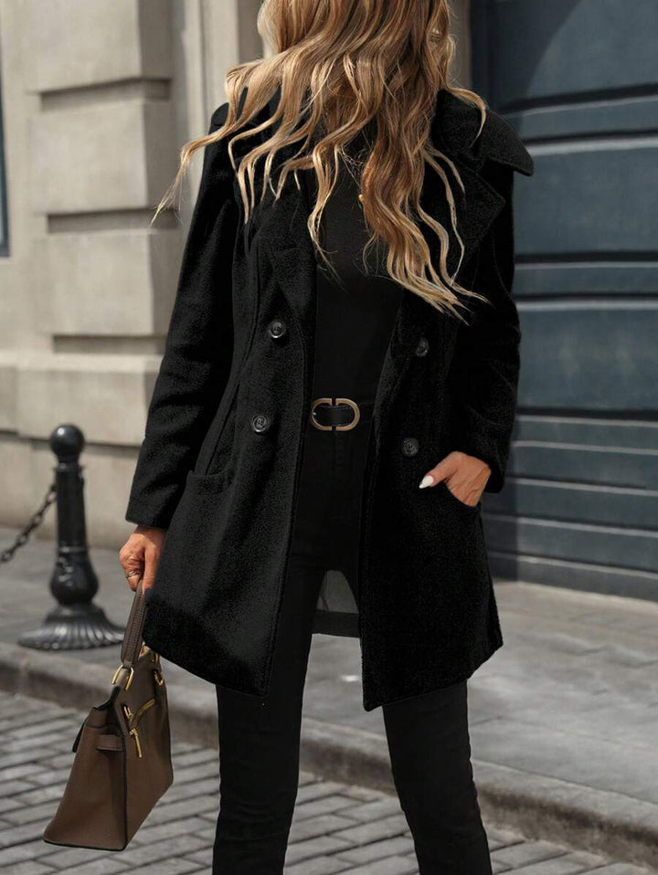 Women's jacket with large buttons, a notched collar, and pockets
