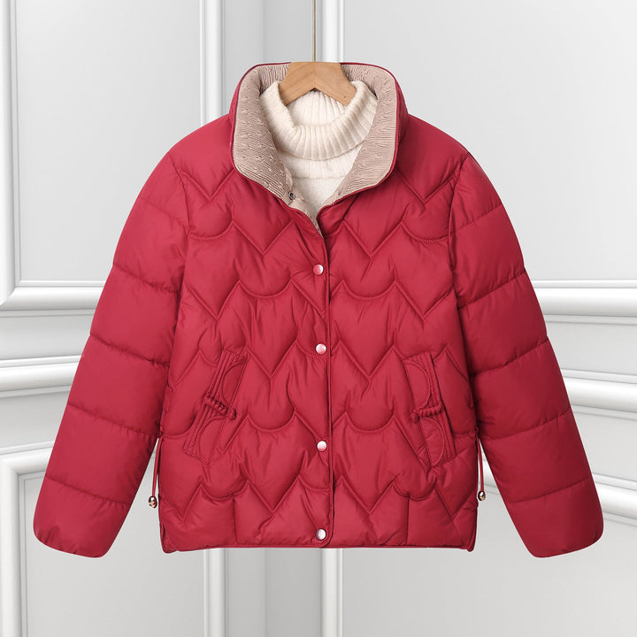Women’s short quilted jacket with curved quilting and snap-button placket