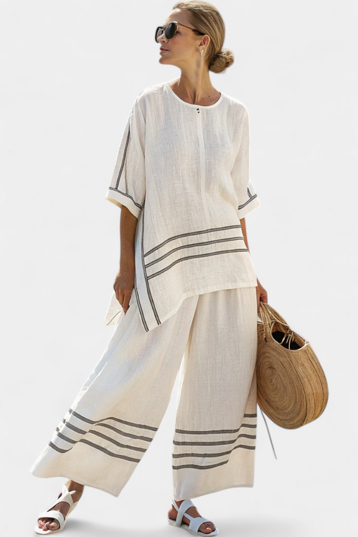 Vittorina – asymmetrical top with sophisticated stripes and daring trousers