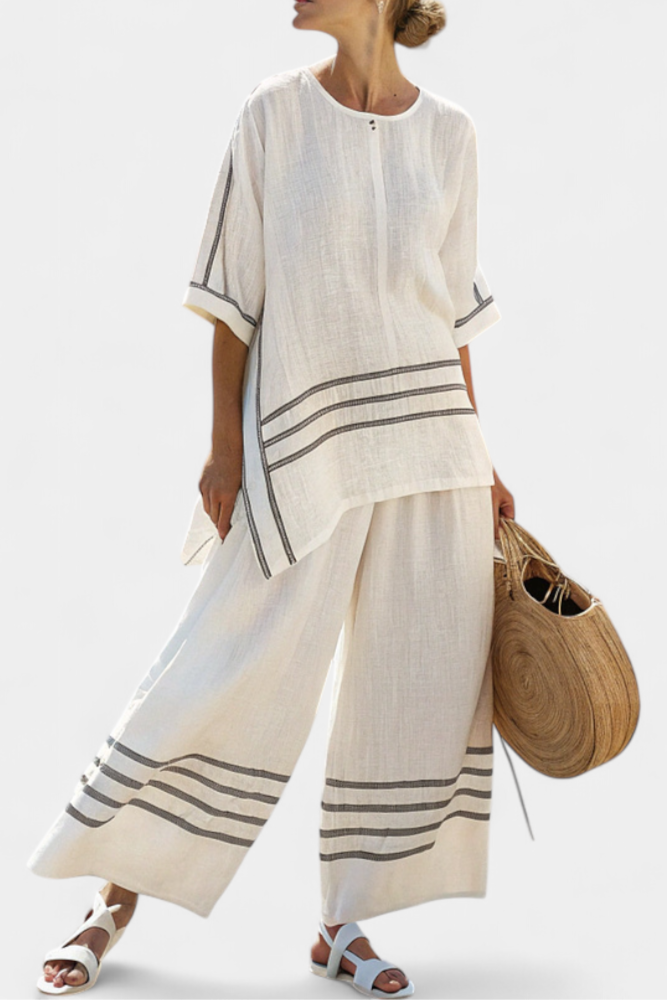 Vittorina – asymmetrical top with sophisticated stripes and daring trousers