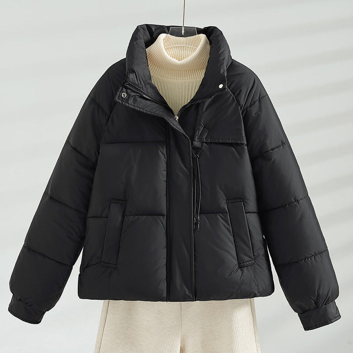 Women’s short padded boxy jacket with a high stand-up collar and drawstring