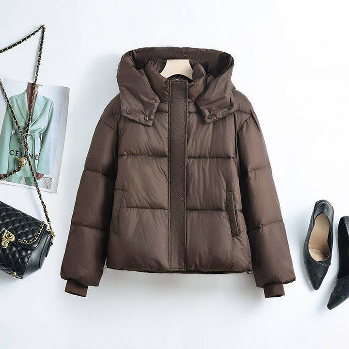 Women's short microfiber puffer jacket with removable collar padding and drawstring hem