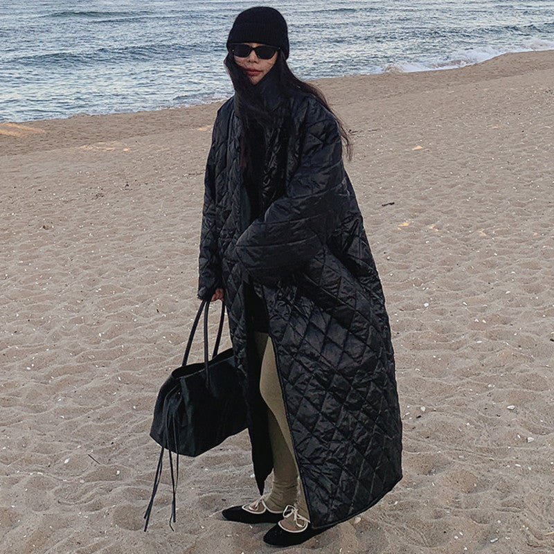 Women’s oversized quilted maxi-length coat with diamond quilting