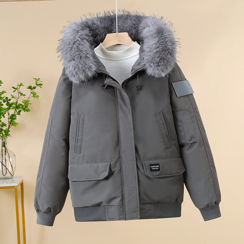 Women’s padded bomber jacket with detachable faux-fur hood and ribbed cuffs