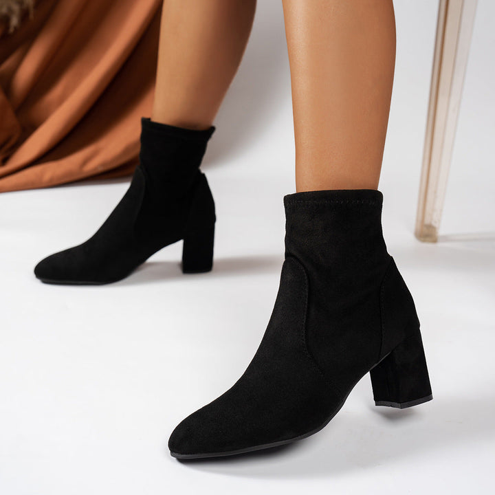 Women’s suede ankle boots with a block heel and cushioned insole