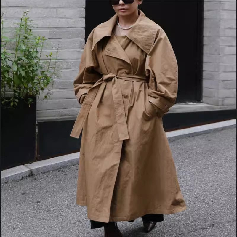 Women’s oversized trench coat with waterfall collar and tie belt