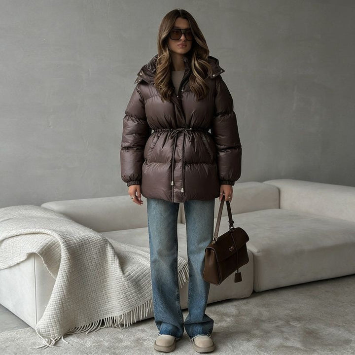 Women's hooded jacket with an adjustable waist drawstring and glossy finish