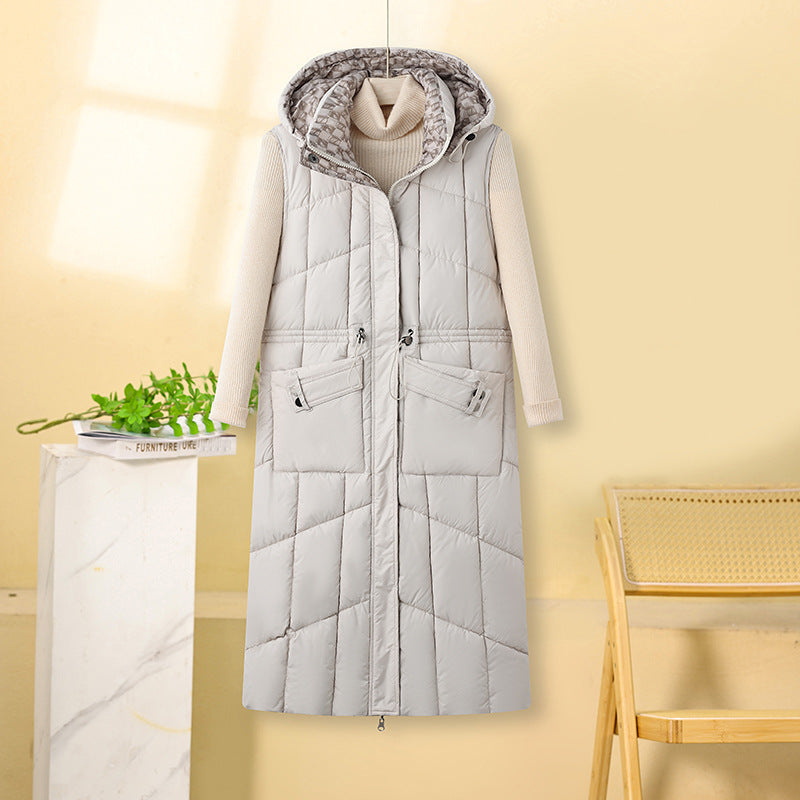 Women’s long sleeveless quilted thermal coat with hood and multifunctional pockets