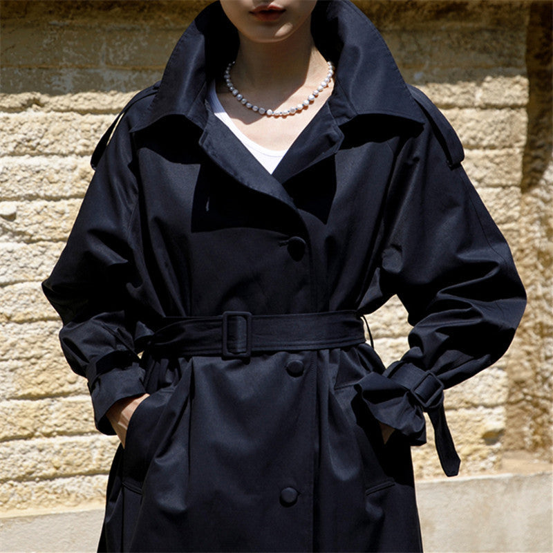 Women’s oversized trench coat with storm flap and detachable tie belt