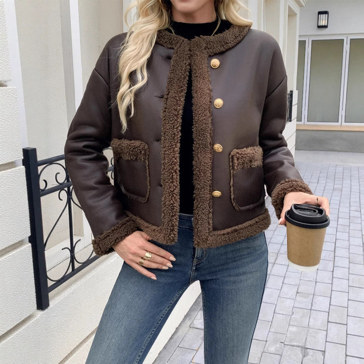 Women's short jacket with a collar and patch pockets
