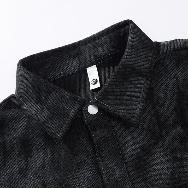 Men’s oversized shirt jacket with an acid-wash finish and snap-button closure