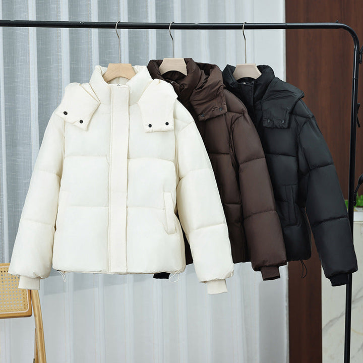 Women's short microfiber puffer jacket with removable collar padding and drawstring hem