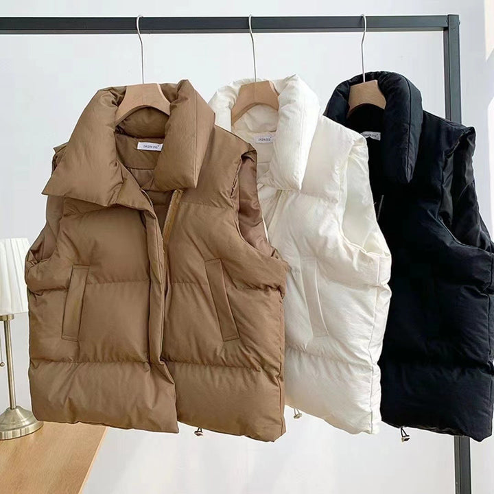 Women's padded quilted vest with shawl collar and adjustable drawstring hem