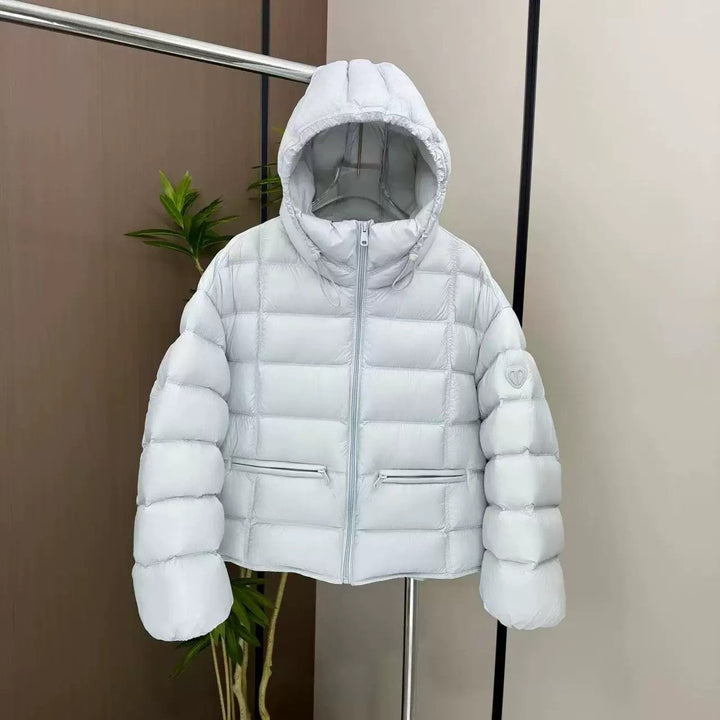 Women’s cropped thermal quilted jacket with hood and zippered pockets