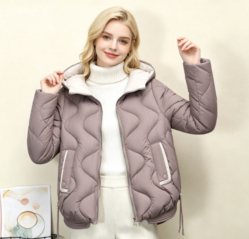 Women's padded short jacket with heart-shaped quilting, a rounded hem, and a hood