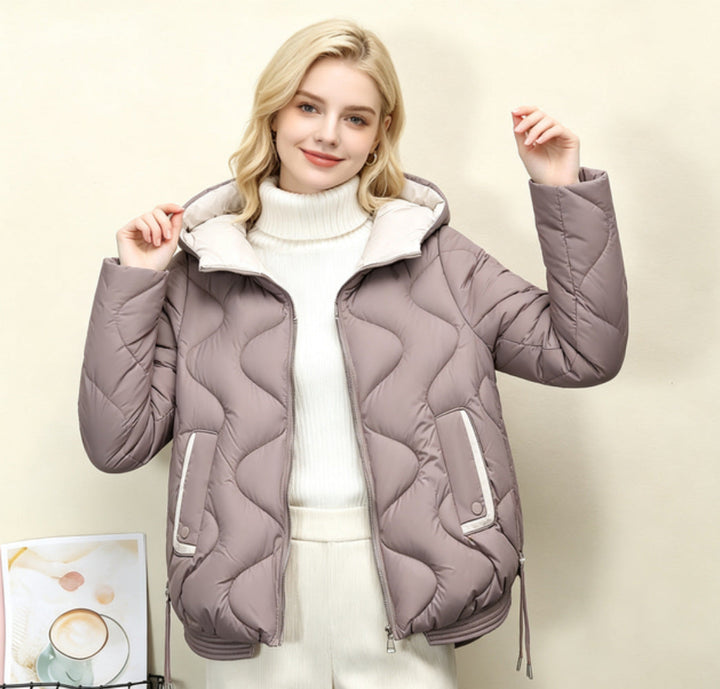 Women's padded short jacket with heart-shaped quilting, a rounded hem, and a hood