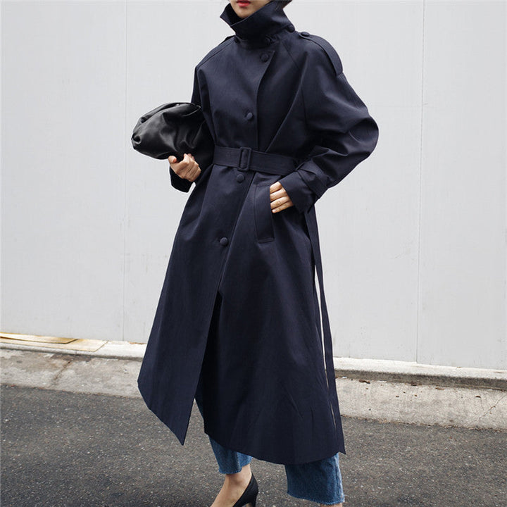 Women's long trench coat with waist belt and high stand-up collar