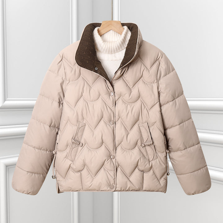 Women’s short quilted jacket with curved quilting and snap-button placket