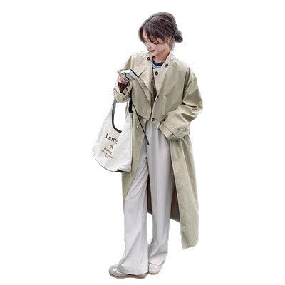 Women’s oversized trench coat with cape back and drawstring waist