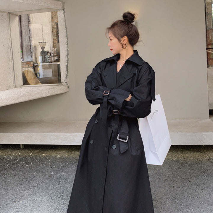 Women's oversized trench coat with double-breasted button fastening and storm flap