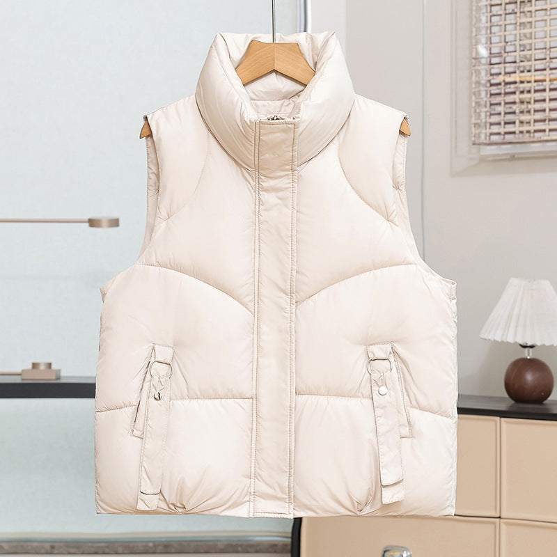 Women's padded quilted vest with a high stand-up collar and decorative ring loops