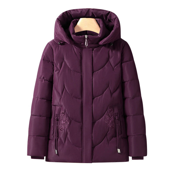 Women’s quilted thermal outdoor jacket with a hood and floral pocket embroidery