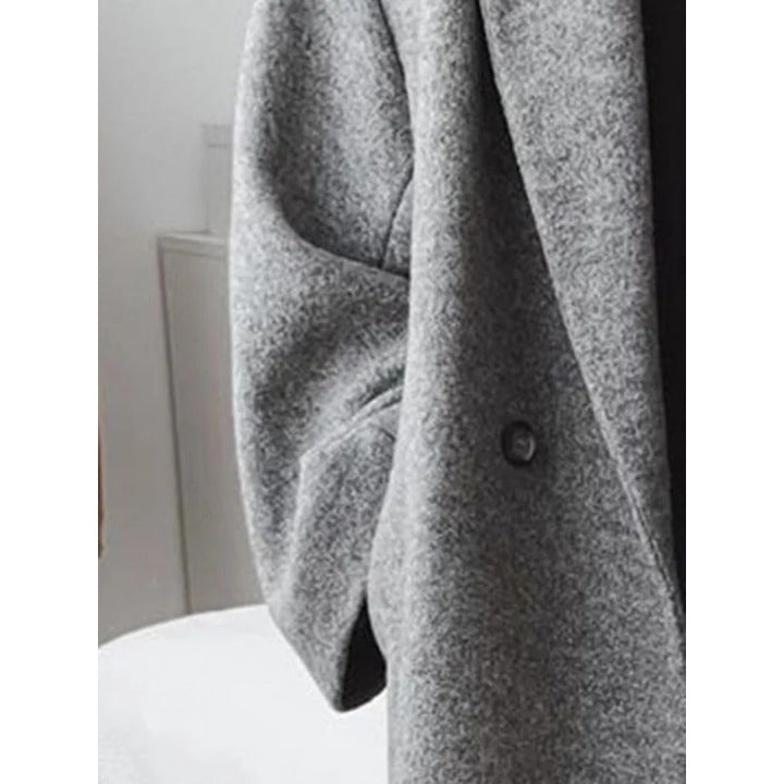 Women’s Oversized Coat with Notched Lapels and Double-Breasted Button Closure