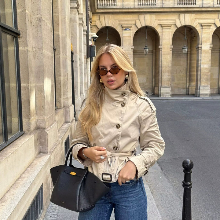 Women's trench jacket with belt and double-breasted button closure