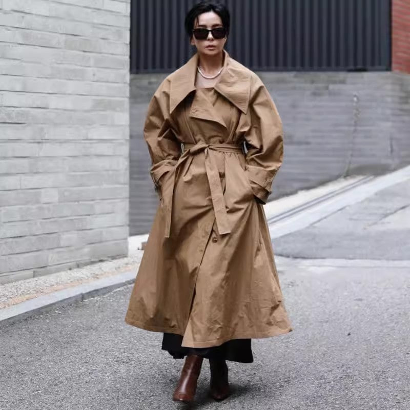 Women’s oversized trench coat with waterfall collar and tie belt
