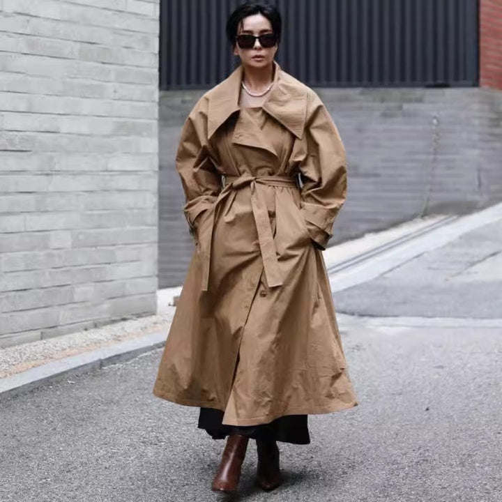 Women’s oversized trench coat with waterfall collar and tie belt