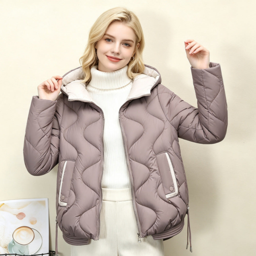 Women's padded short jacket with heart-shaped quilting, a rounded hem, and a hood
