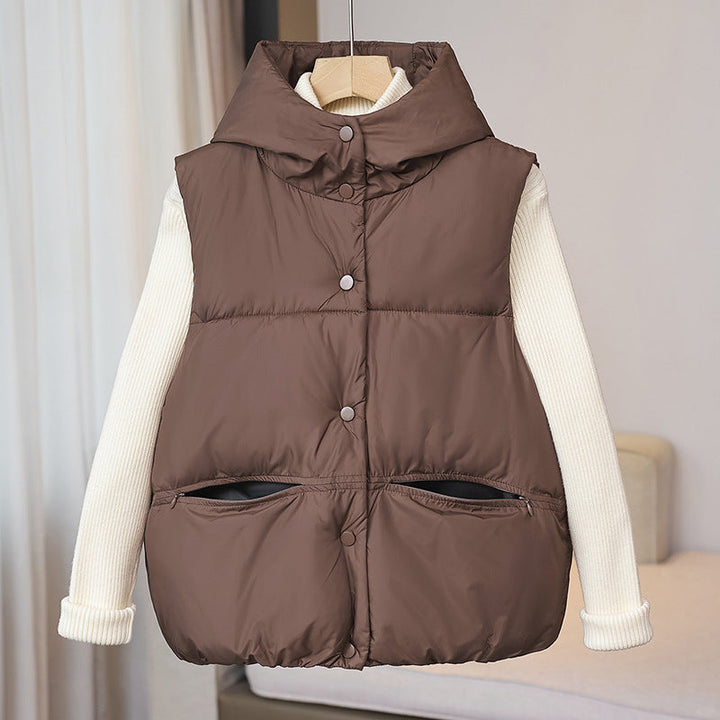 Women's padded sleeveless quilted vest with a voluminous stand collar and zippered pockets