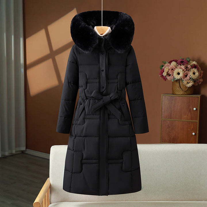 Women’s long quilted winter coat with detachable faux-fur collar and waist belt
