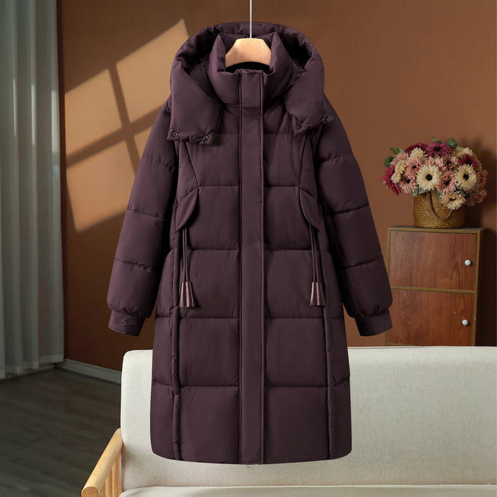 Women’s long padded hooded coat with a high stand-up collar and concealed zipper