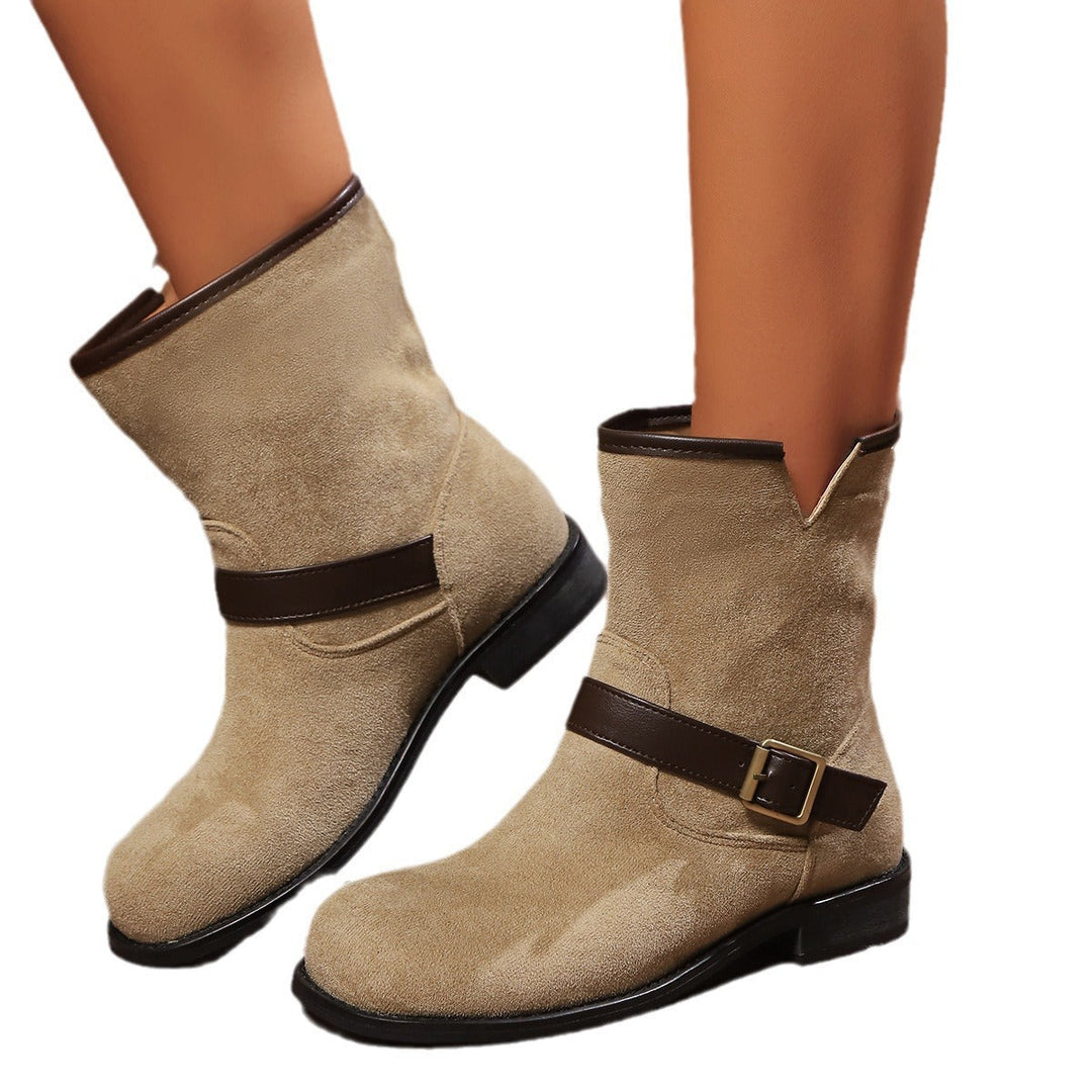 Women's ankle boots with a V-cut, strap, and buckle